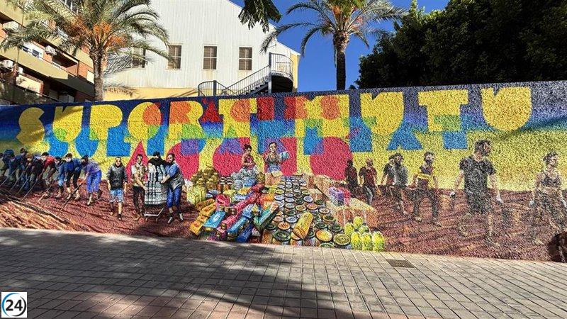 Manises rinde tributo al voluntariado de la dana con un mural y un monumento a la solidaridad.